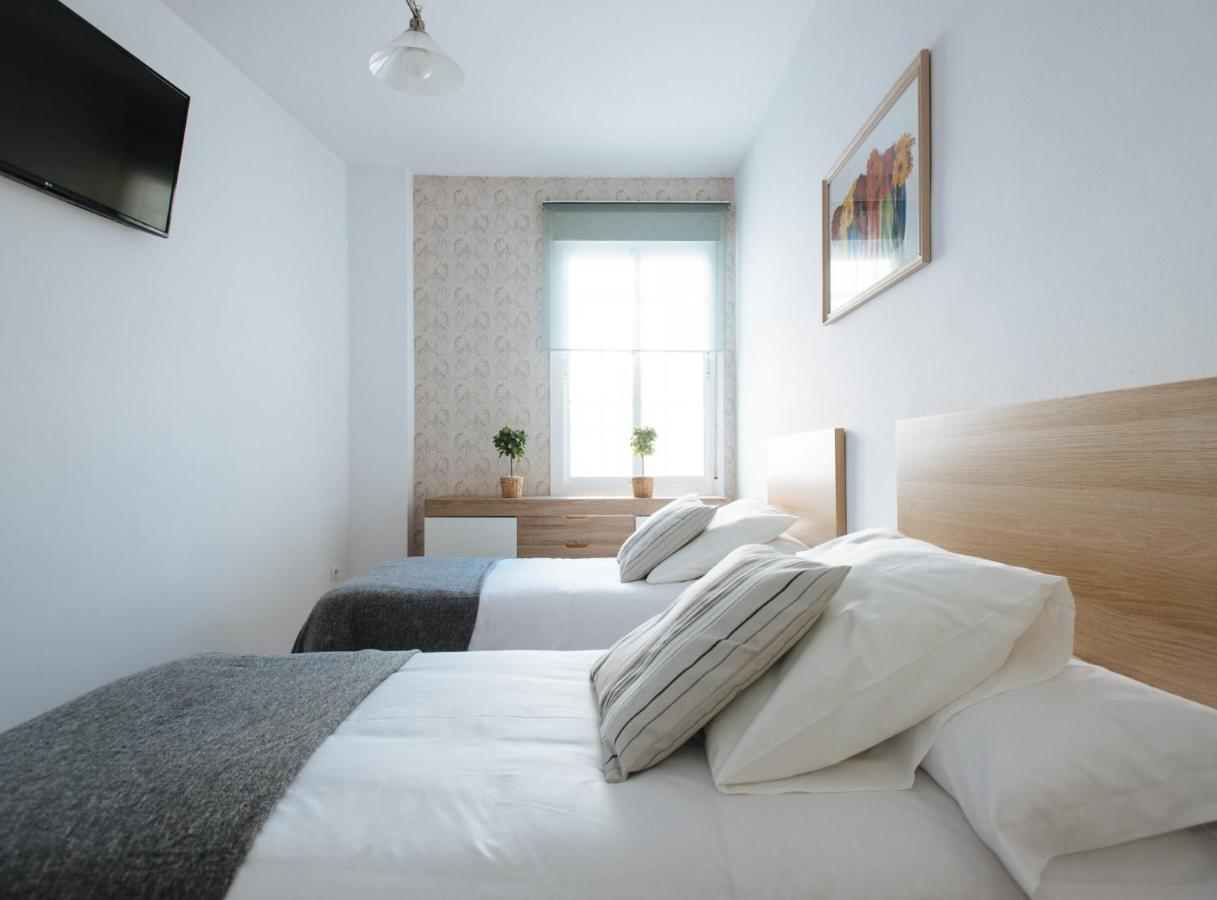 Magno Apartments Siete Revueltas Siviglia Esterno foto